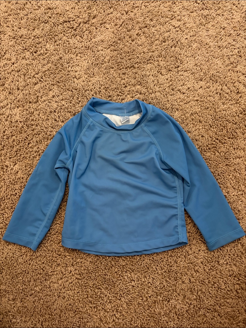 Worn once: Kids Blue Long-Sleeve Swim Shirt